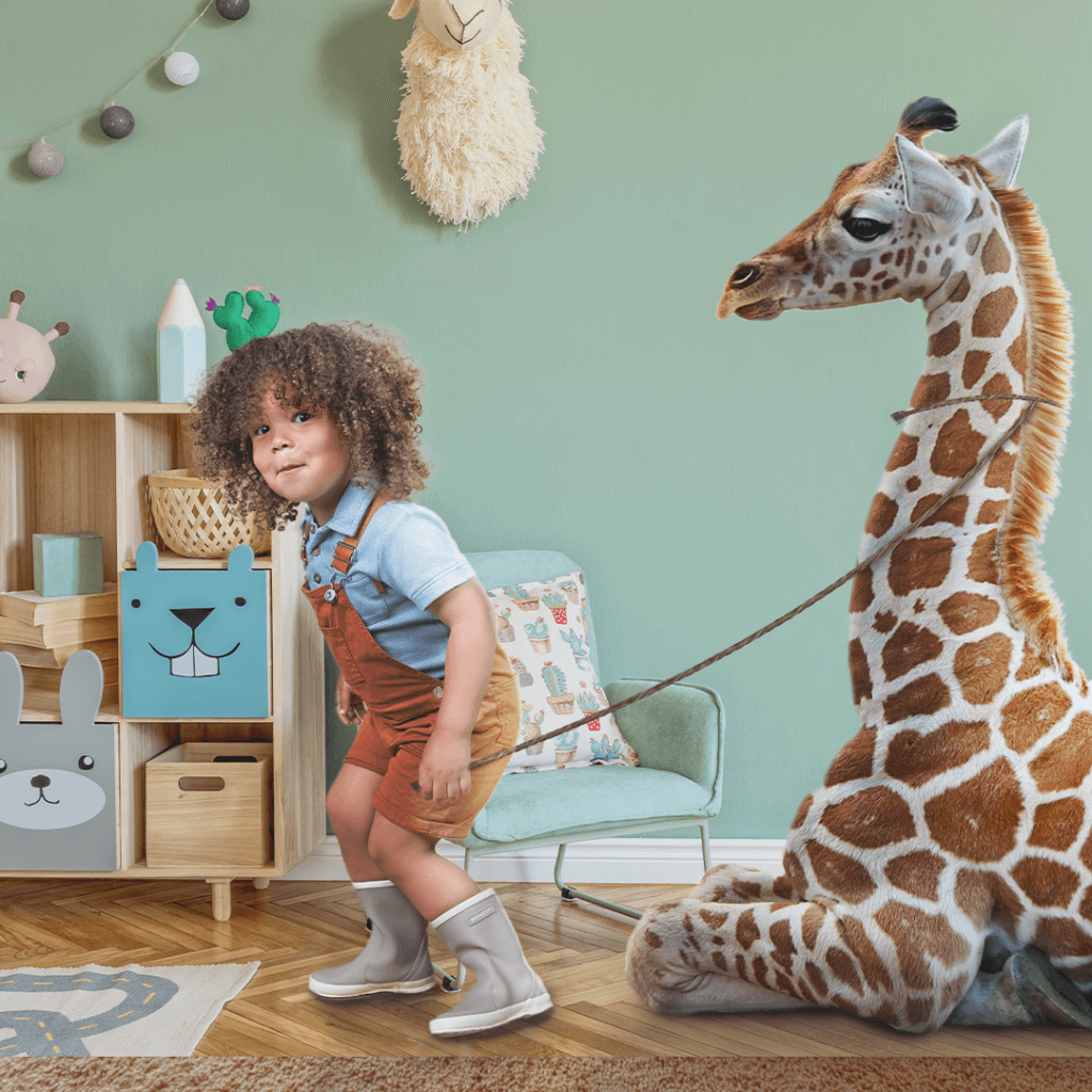 Schattige photoshop-bewerking van een giraffe met een kindje